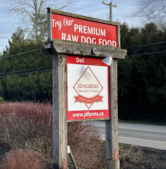 Exterior shot of the JD Farms street signage